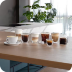 ⁦ماكينة تحضير الاسبرسو ديلونجي Magnifica Plus، بقوة 1450 وات، اسود - ECAM320.61.G⁩ - الصورة ⁦4⁩